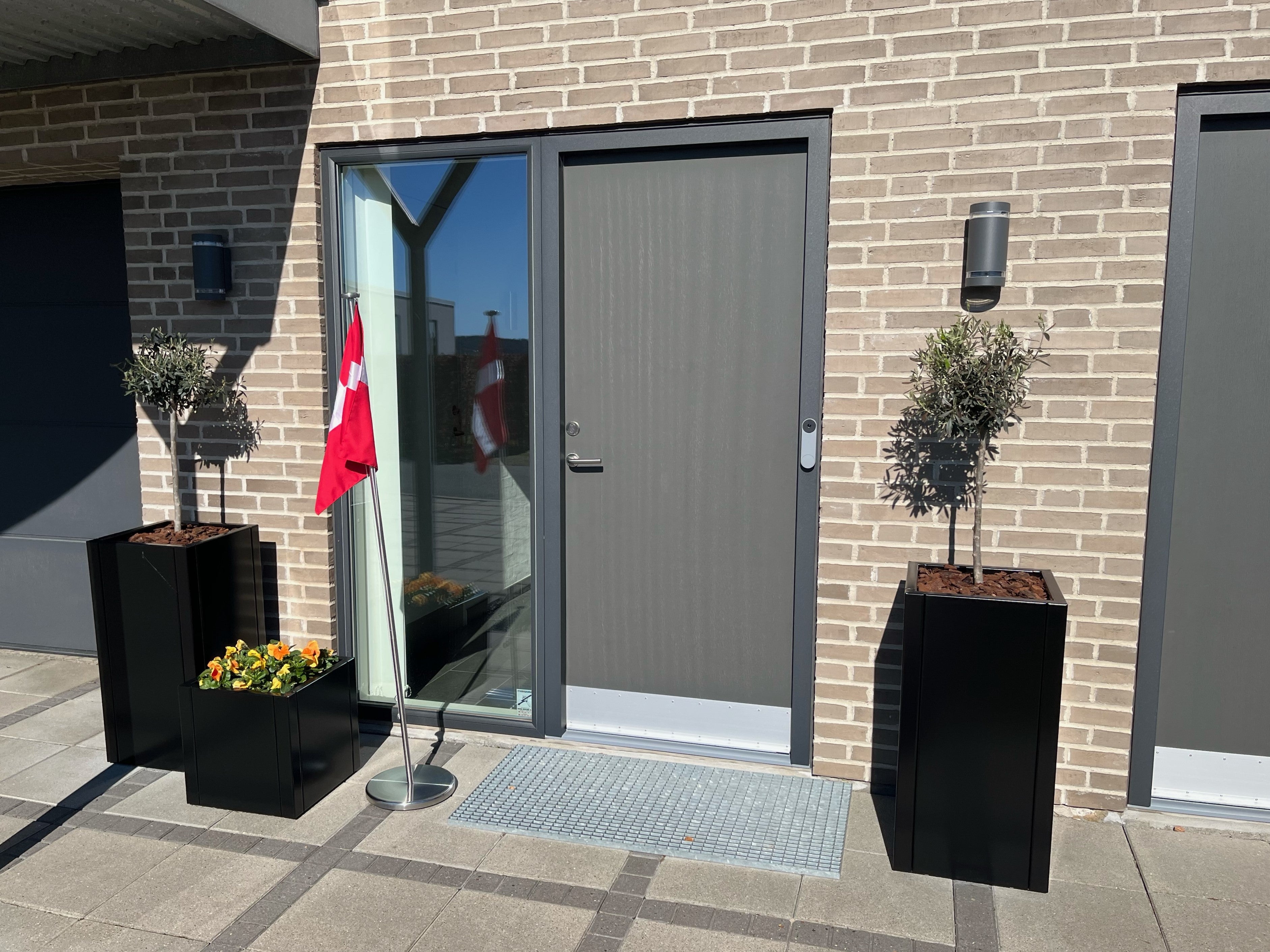 Black lacquered planter boxes