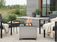 CUBY Feuergrill aus verzinktem Stahl im gemütlichen Loungebereich auf der Terrasse