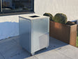 CUBY Feuergrill aus verzinktem Stahl im Außenbereich am Wohnhaus
