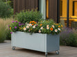 Mobiler Pflanzkasten aus verzinktem Stahl von CUBY mit Sommerblumen