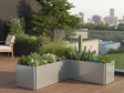 Niedriger EDGY Eck-Pflanzkübel aus verzinktem Stahl auf Dachterrasse