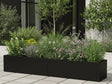 Pflanzkasten aus schwarzem Stahl mit Stauden und Gräsern